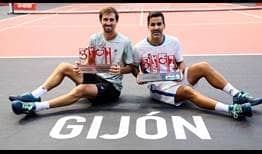 Andres Molteni and Maximo Gonzalez celebrate winning the title in Gijon on Sunday.