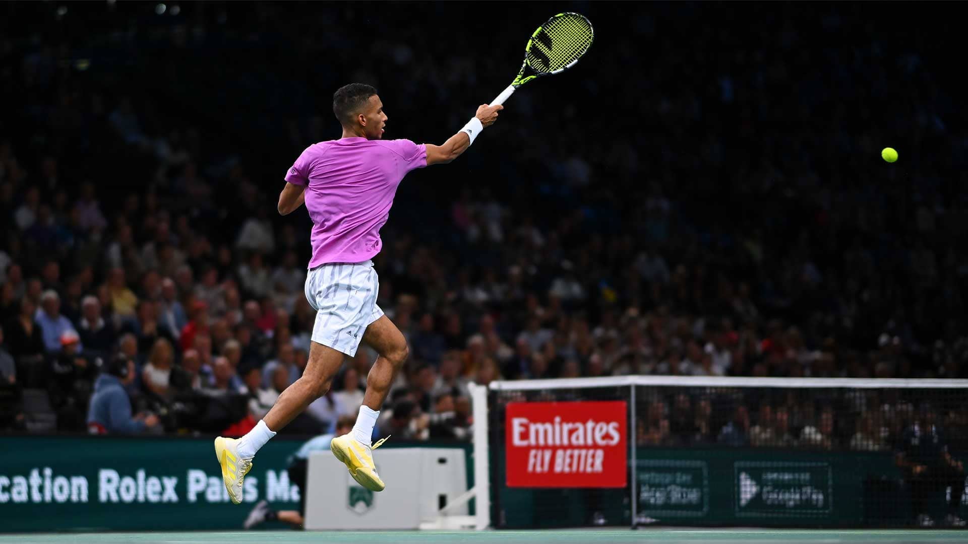 Felix Auger-Aliassime fires a forehand on Saturday at the Rolex Paris Masters.
