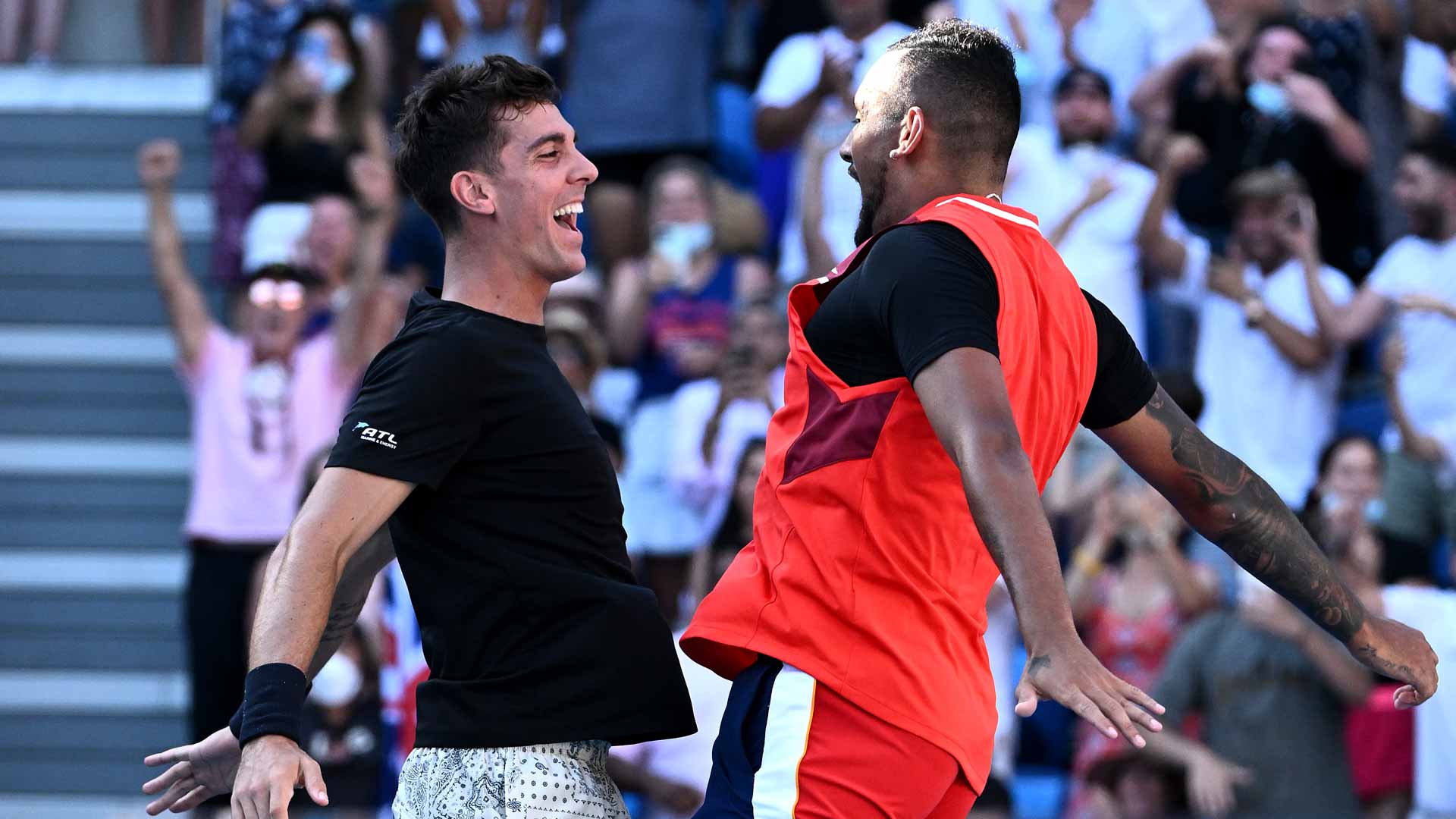 Thanasi Kokkinakis (left) and Nick Kyrgios at the 2022 Australian Open.