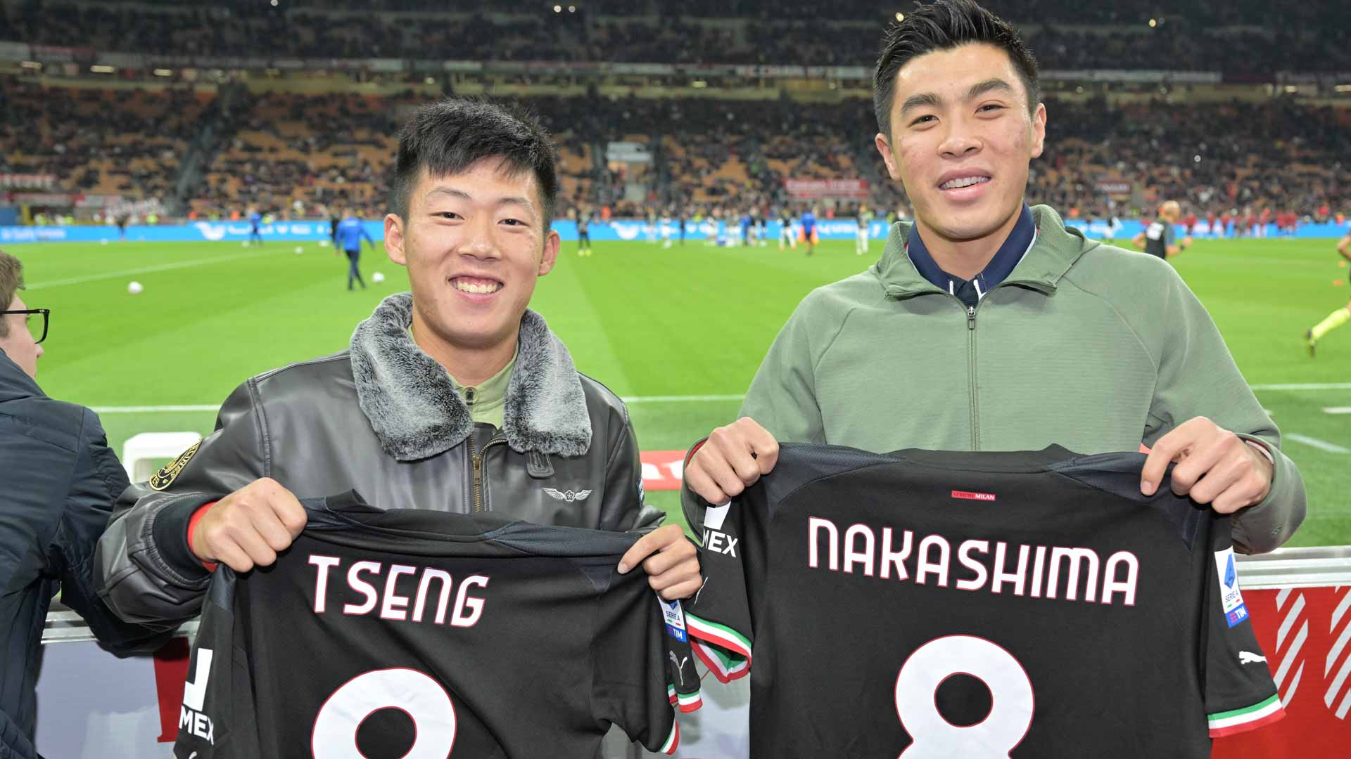 Chun-Hsin Tseng and Brandon Nakashima watch AC Milan play at the San Siro on Saturday.