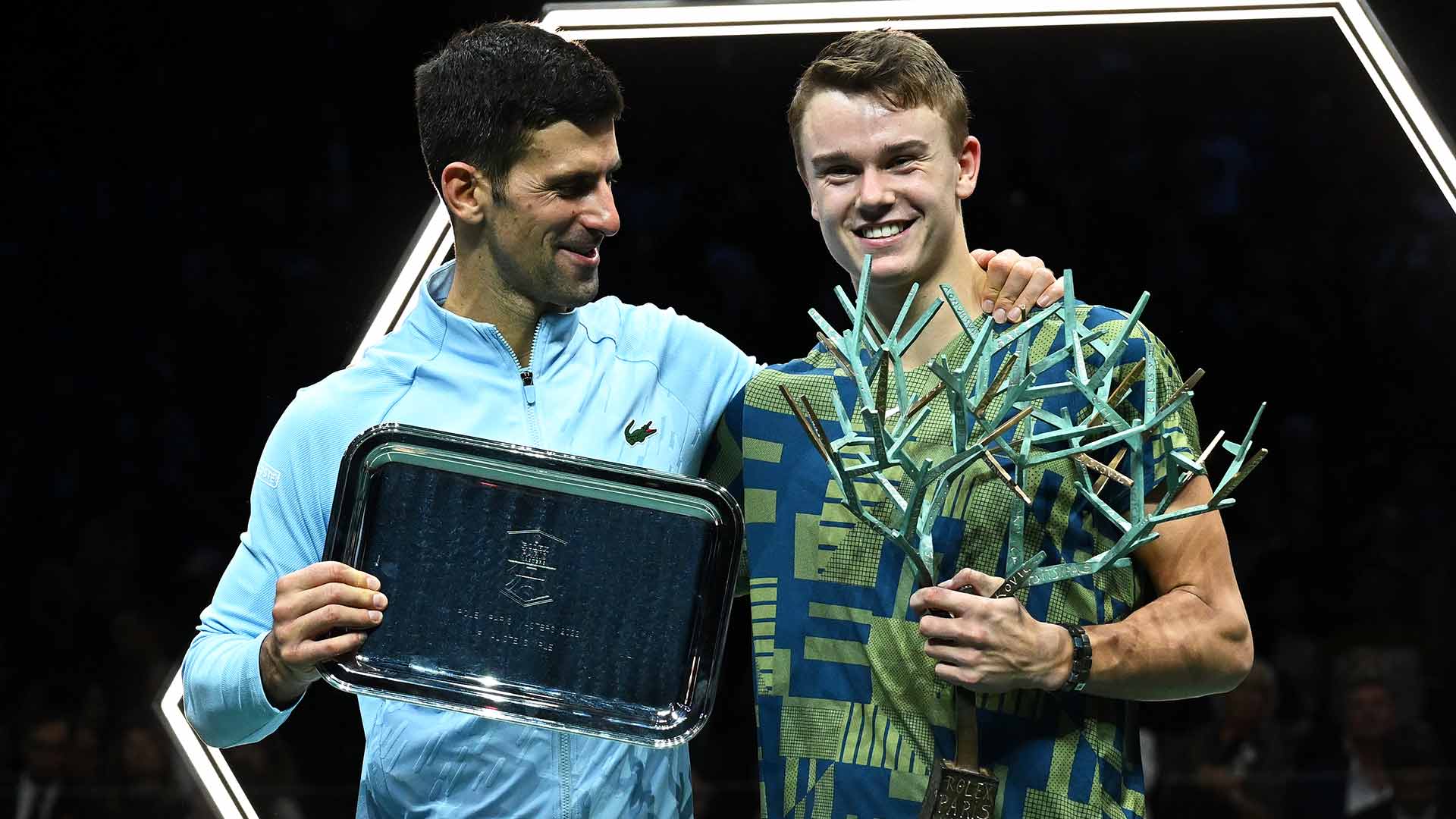 Novak Djokovic congratulates Holger Rune on his first ATP Masters 1000 title in Paris.