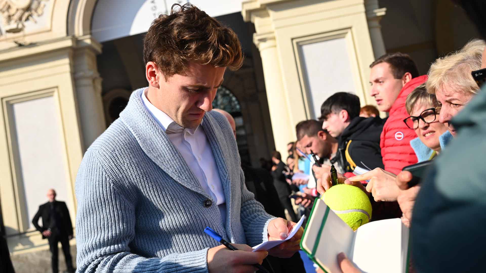 Casper Ruud greets fans at the 2022 Nitto ATP Finals media day.