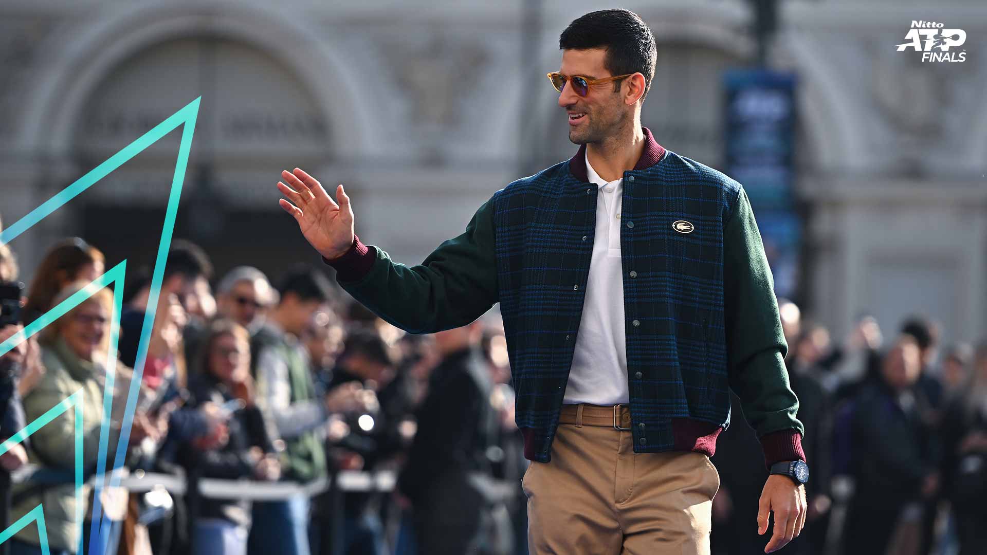 Novak Djokovic greets fans on Friday at Turin's Piazza San Carlo.