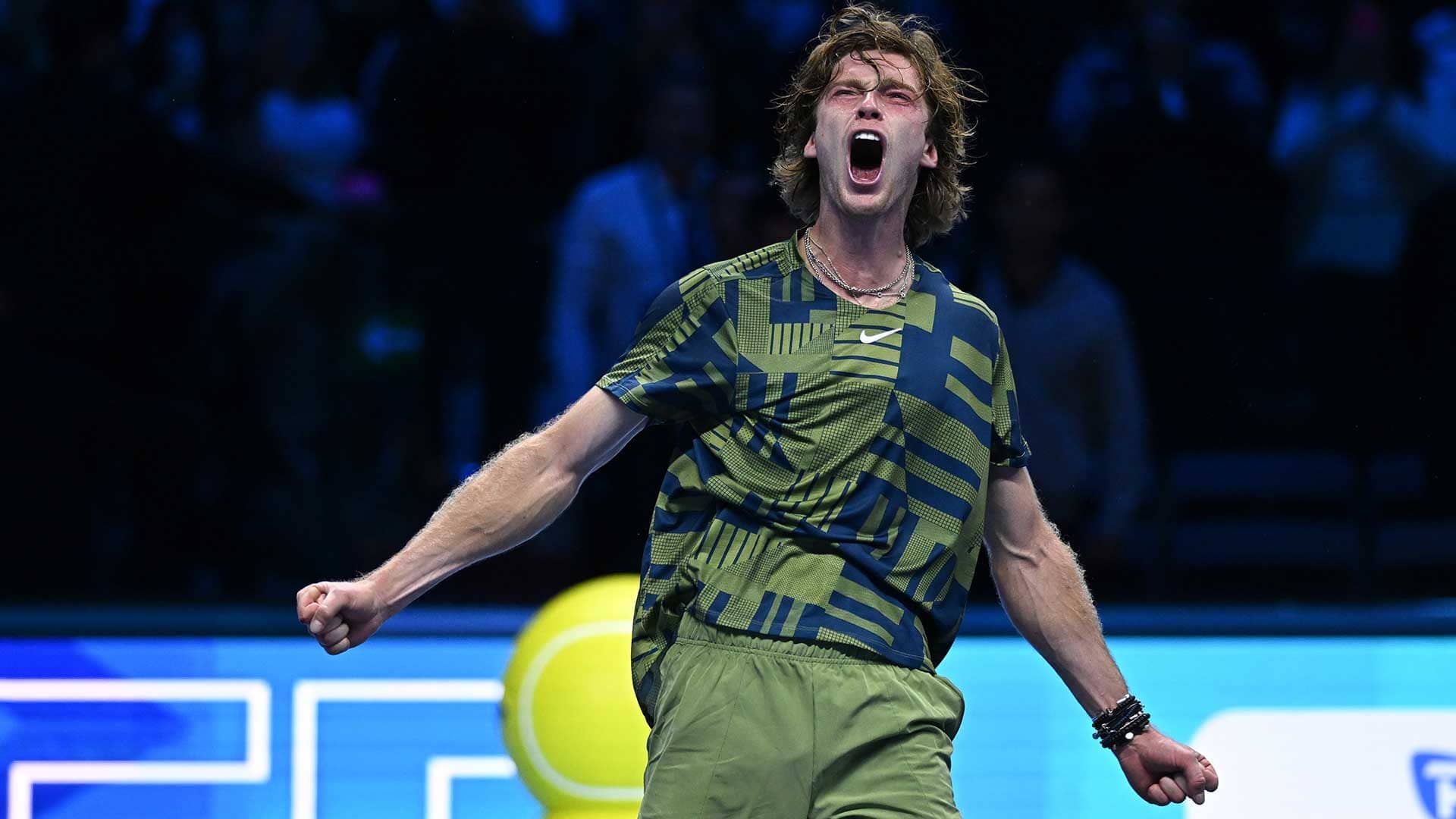 Andrey Rublev celebrates defeating Daniil Medvedev on Monday in Turin.