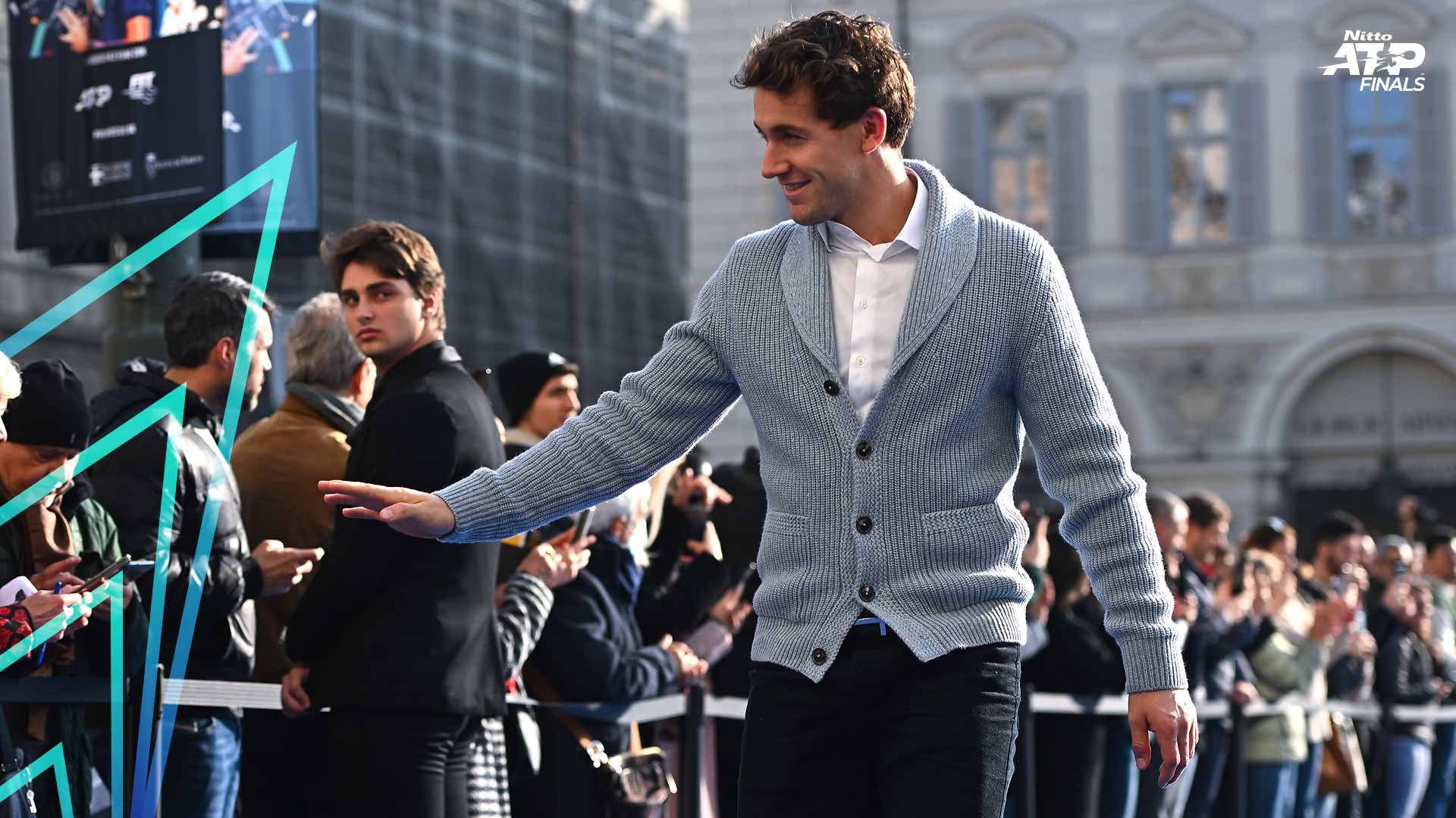 Casper Ruud greets fans on Friday at Turin's Piazza San Carlo.