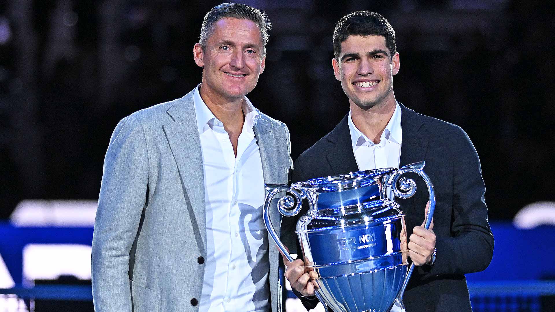 ATP Chairman Andrea Gaudenzi presents Carlos Alcaraz with the year-end ATP No. 1 Trophy presented by Pepperstone on Wednesday in Turin.