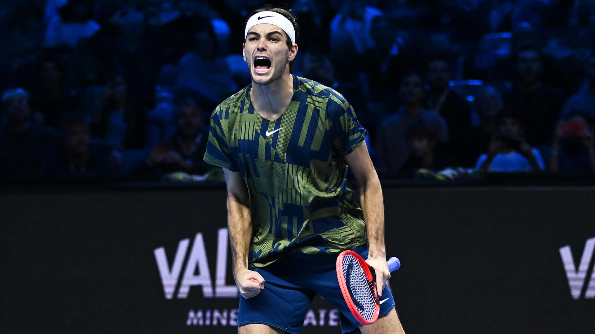 Taylor Fritz celebrates defeating Felix Auger-Aliassime on Friday at the Nitto ATP Finals.
