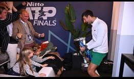 Novak Djokovic celebrates his record-tying sixth Nitto ATP Finals title with his family.