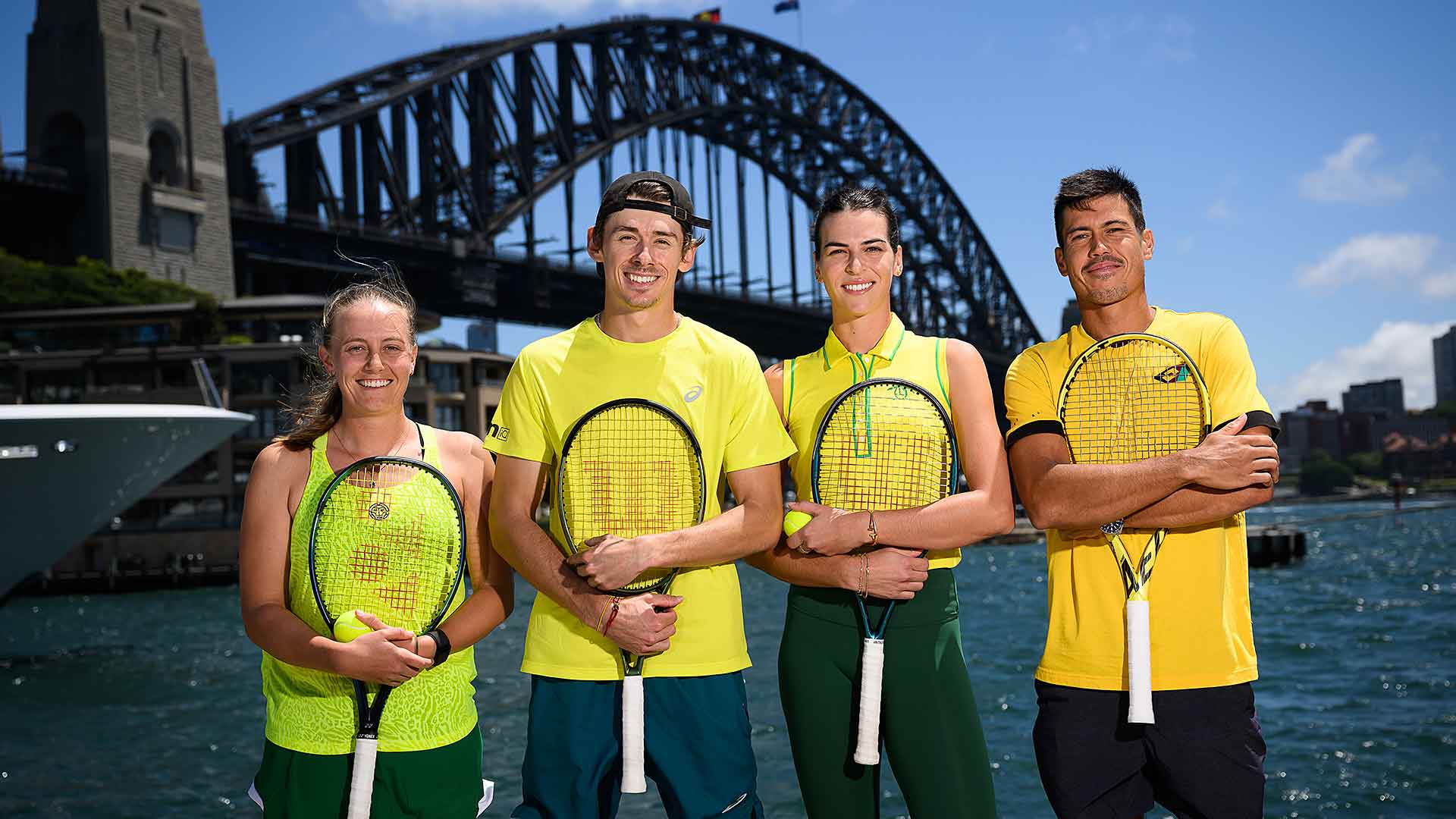 Zoe Hives, Alex de Minaur, Ajla Tomljanovic and Jason Kubler of Team Australia visit Campbells Cove, Sydney on Tuesday.