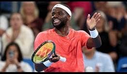 Frances Tiafoe celebrates his victory for Team United States on Wednesday in Sydney.