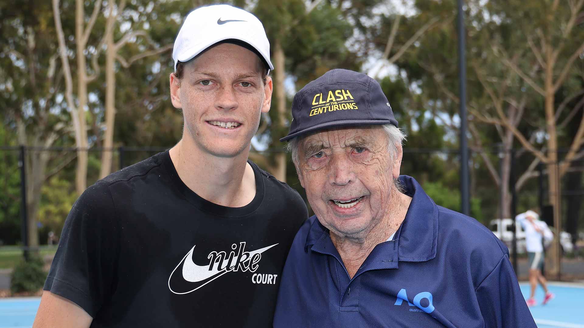 Twenty-one-year-old Jannik Sinner and 99-year-old Henry Smith share a hit in Adelaide.