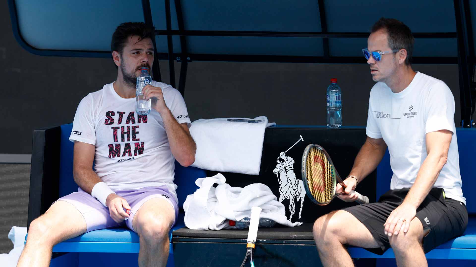 Stan Wawrinka and coach Magnus Norman chat during a practice session ahead of the 2023 Australian Open.