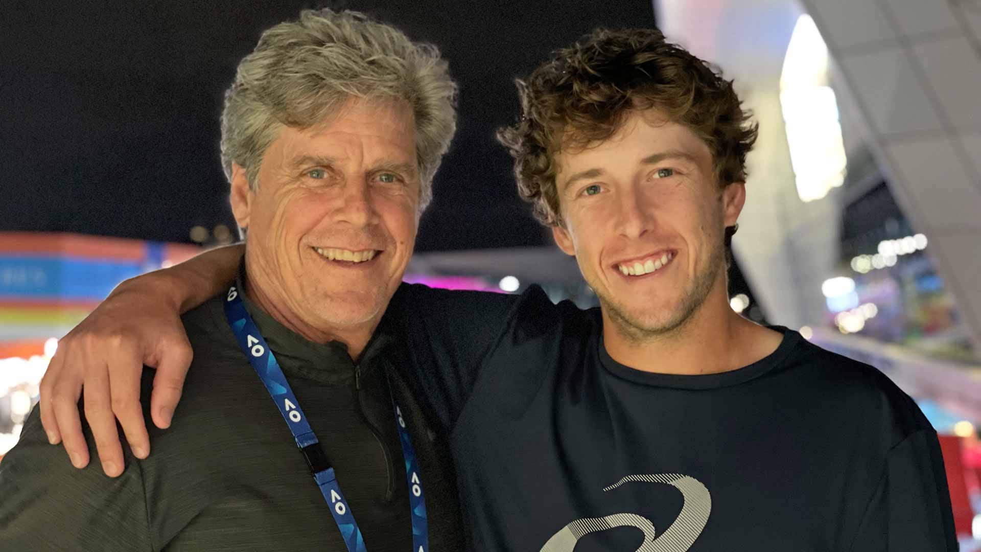 Scott Holt and Brandon Holt celebrate the latter's first-round victory at the Australian Open.