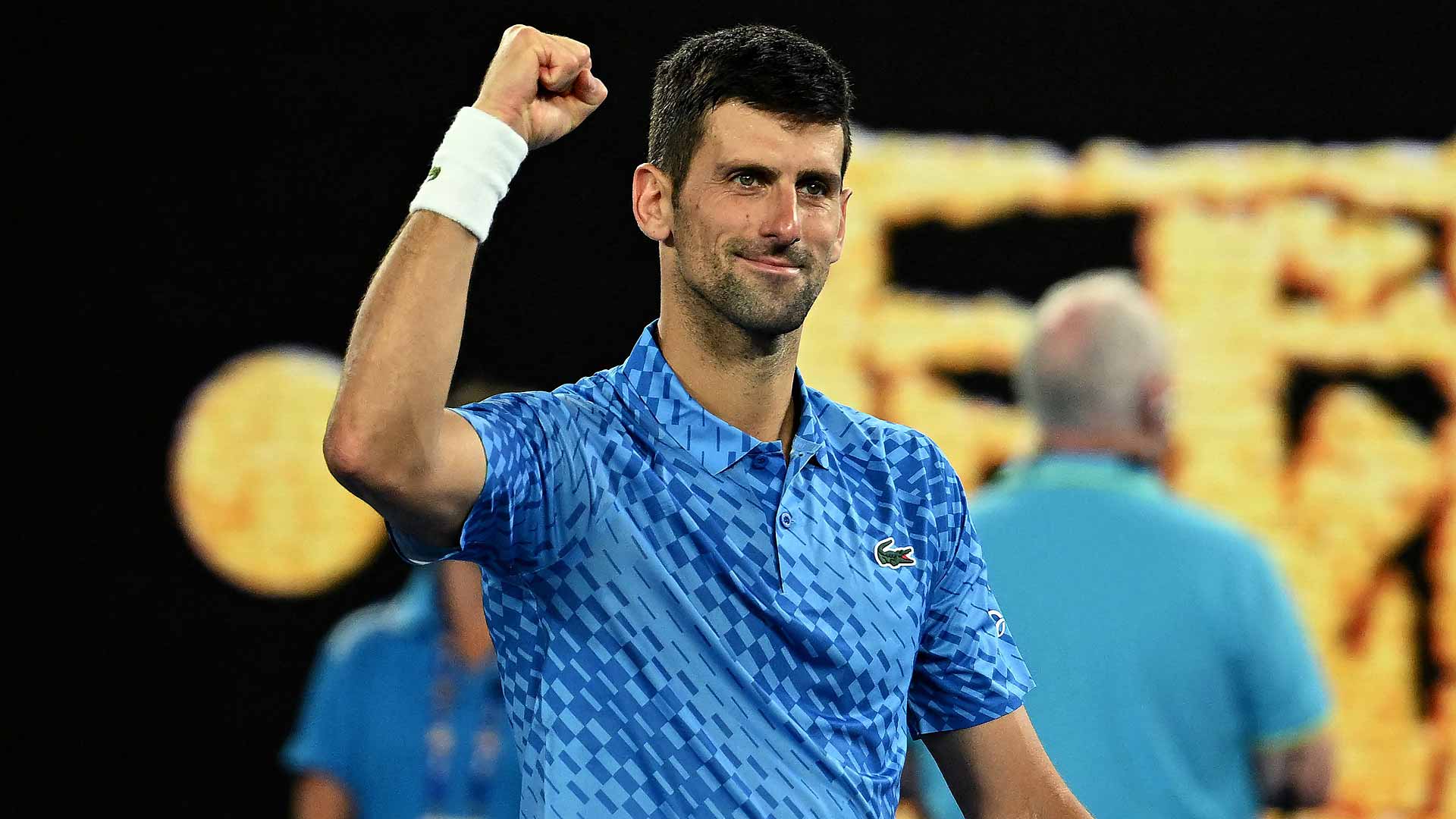 Novak Djokovic celebrates his fourth-round win against Alex de Minaur on Monday in Melbourne.