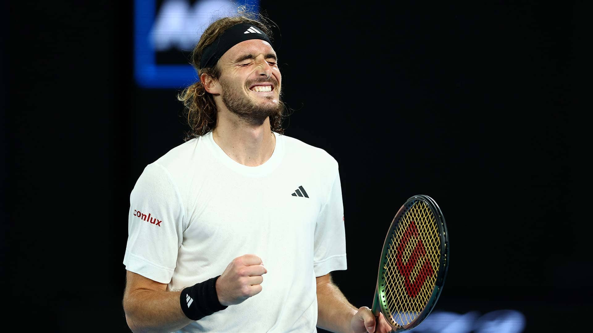 Stefanos Tsitsipas celebrates reaching his fourth Australian Open semi-final on Tuesday.