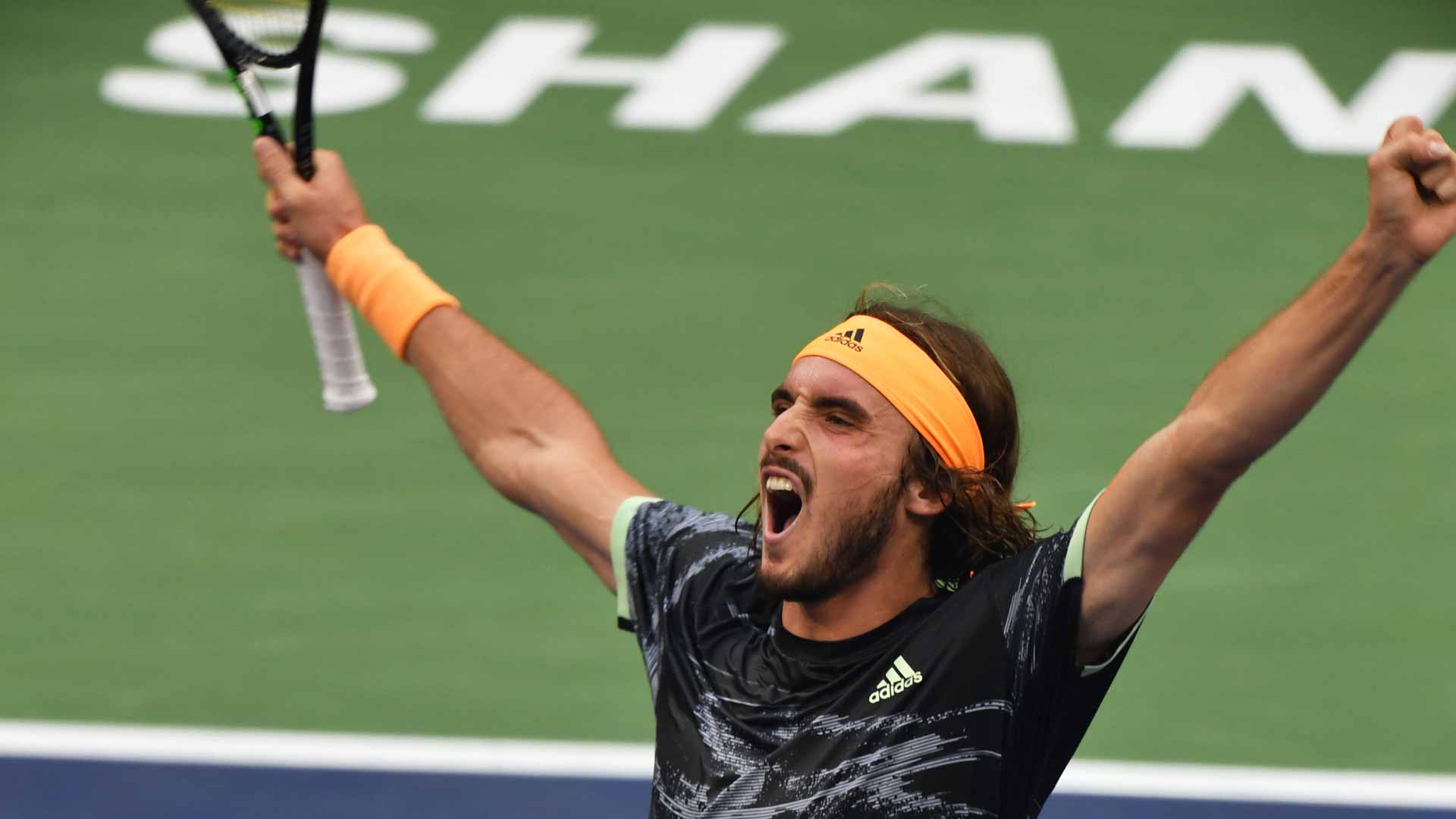 <a href='https://www.atptour.com/en/players/stefanos-tsitsipas/te51/overview'>Stefanos Tsitsipas</a> celebrates his second win over <a href='https://www.atptour.com/en/players/novak-djokovic/d643/overview'>Novak Djokovic</a> at the 2019 ATP Masters 1000 event in Shanghai.