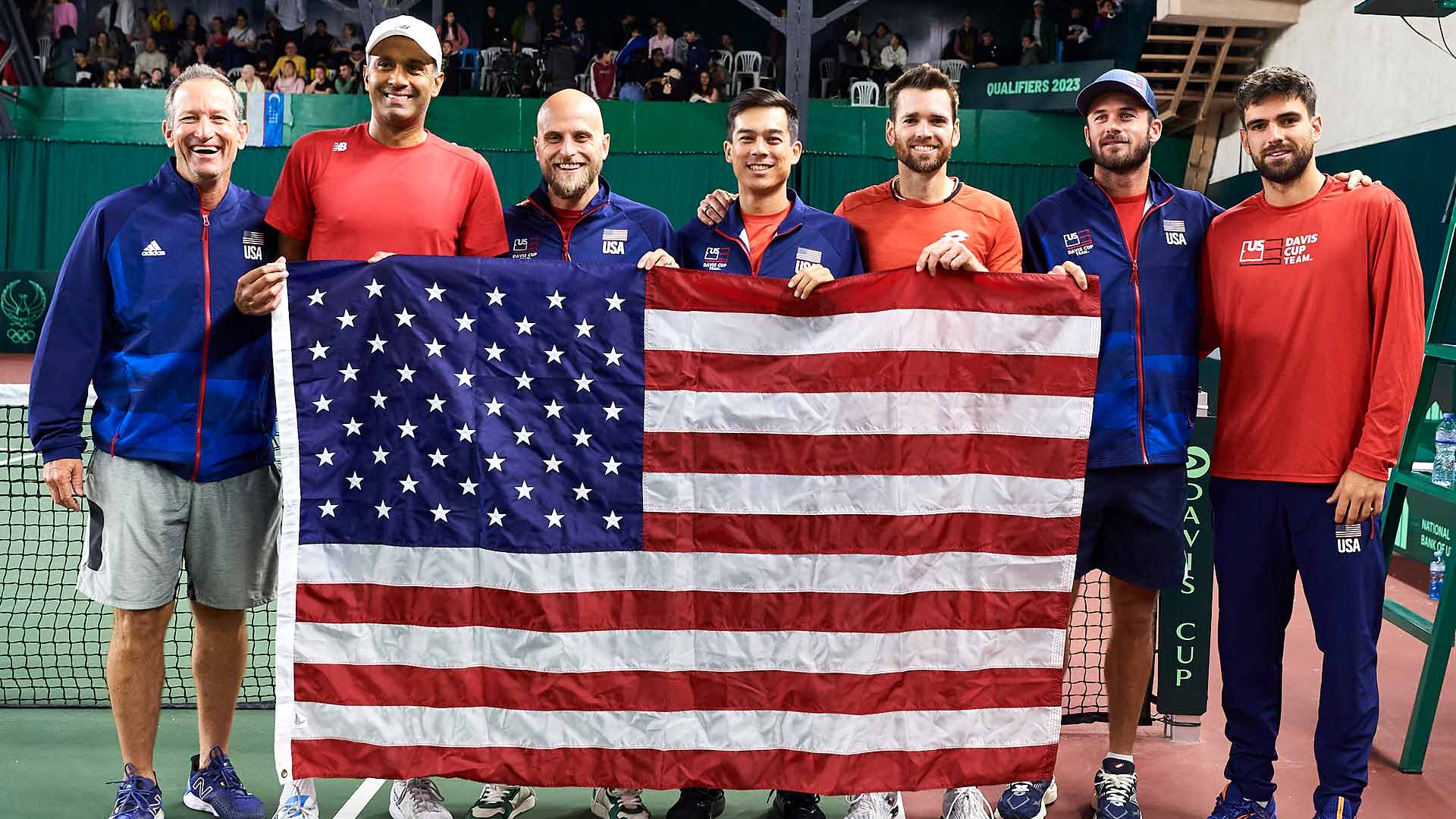 The United States Davis Cup team celebrates its 4-0 victory against Uzbekistan on Saturday in Tashkent.