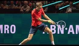 Daniil Medvedev fires a backhand against Jannik Sinner on Sunday during the championship match at the ABN AMRO Open.