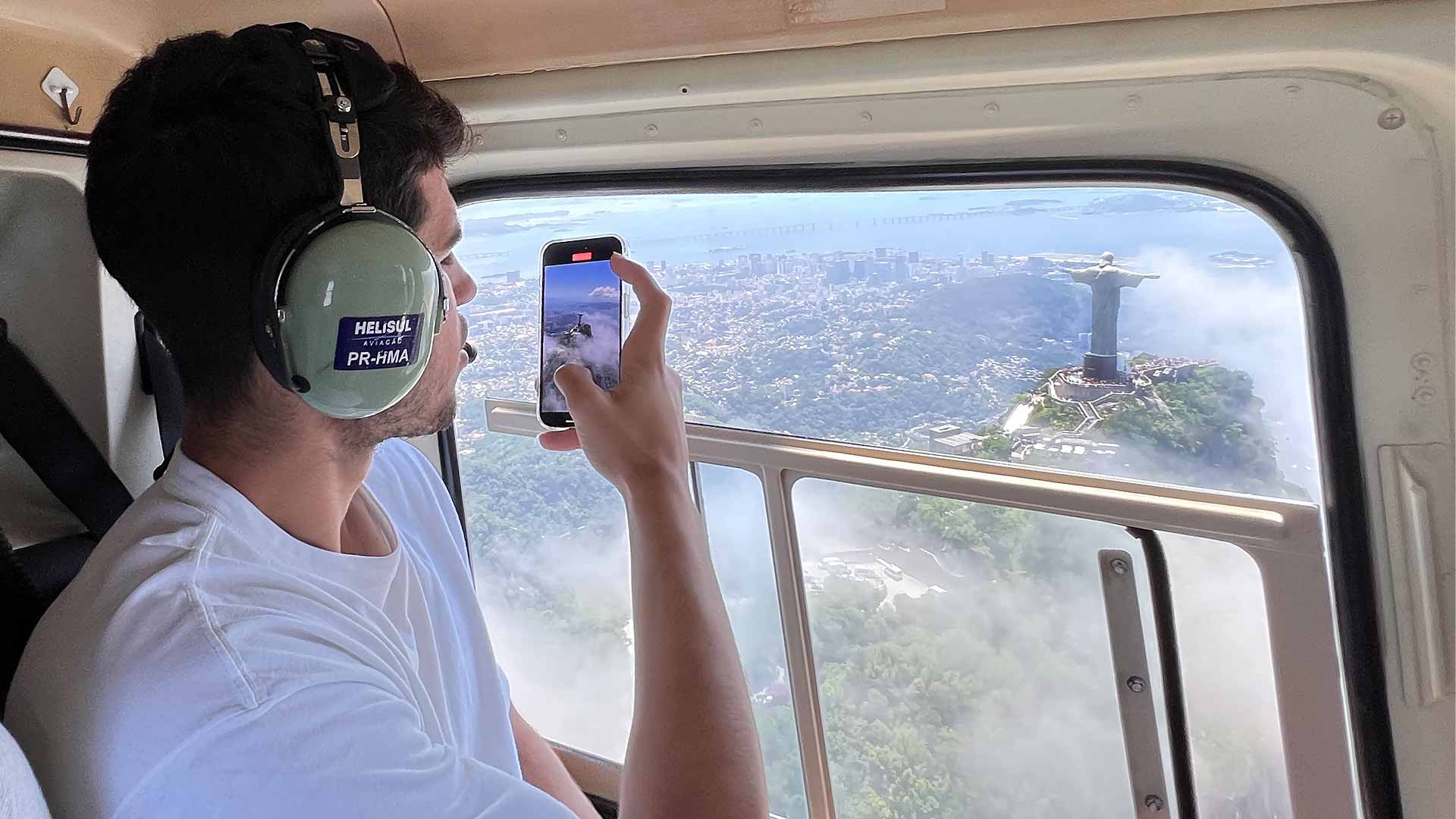 Carlos Alcaraz takes photos of Christ the Redeemer in Rio de Janeiro.