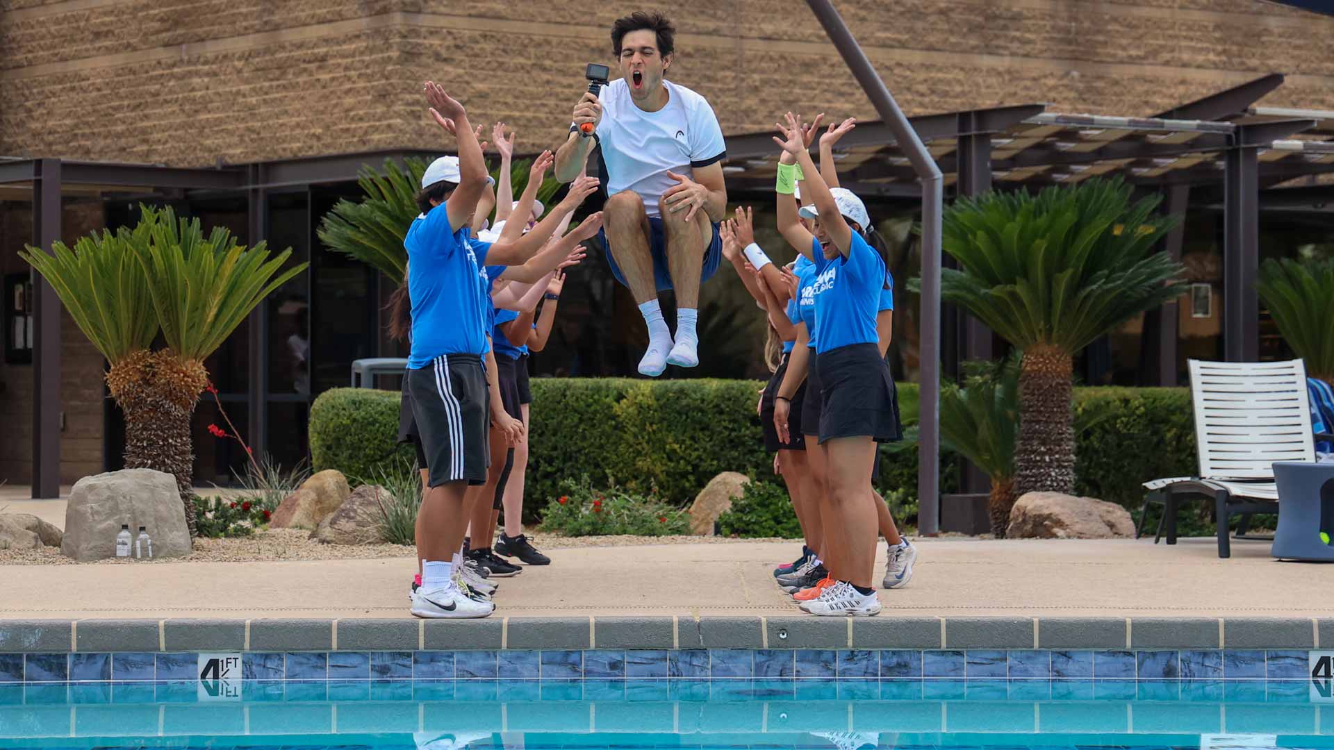 Nuno Borges celebrates his title at the Arizona Tennis Classic with a pool plunge.