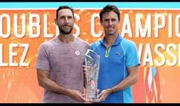 Santiago Gonzalez and Edouard Roger-Vasselin lift the Miami Open presented by Itau trophy on Saturday.