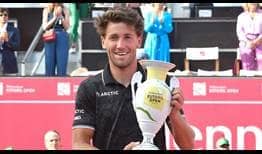 Casper Ruud defeats Miomir Kecmanovic in straight sets on Sunday to lift the Estoril trophy.