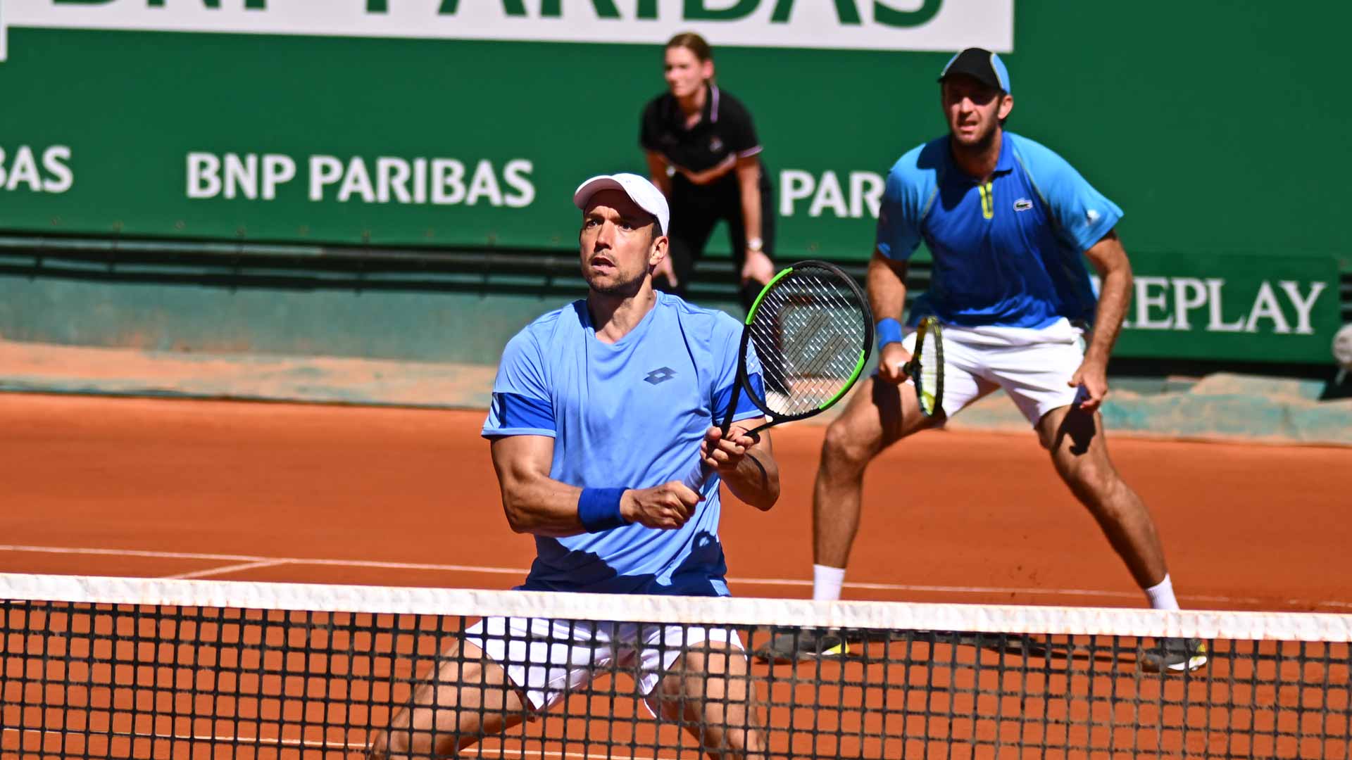 Andreas Mies (at net) and Fabrice Martin during Friday's Monte-Carlo doubles action.
