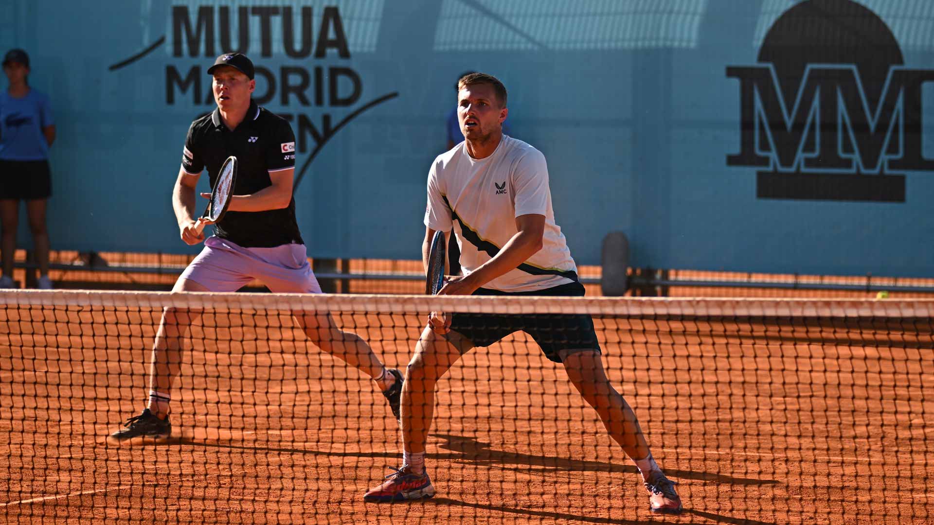 Harri Heliovaara and Lloyd Glasspool save all seven break points against them in the Madrid opening round.