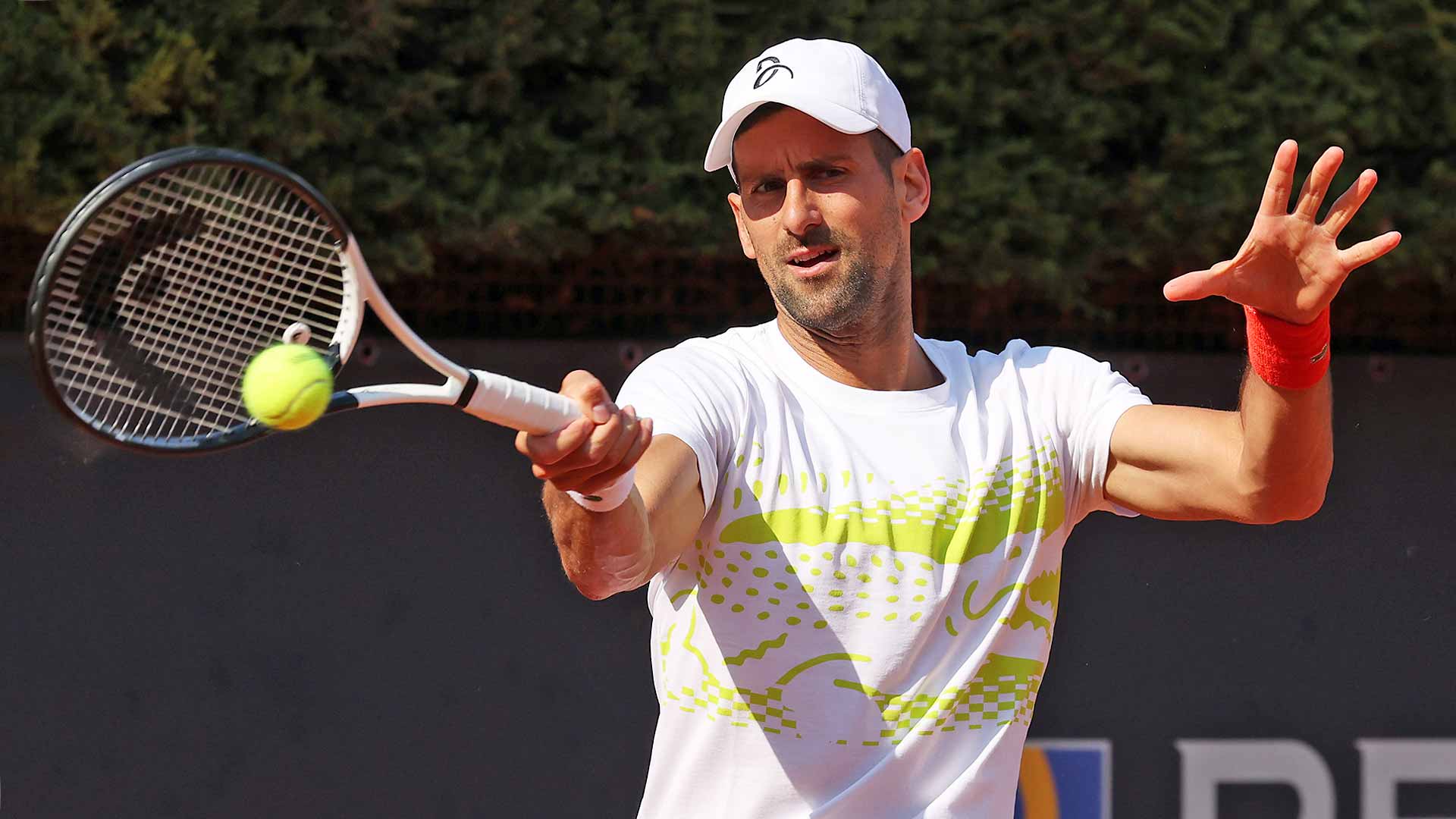 Novak Djokovic fires a forehand during pre-tournament practice in Rome.