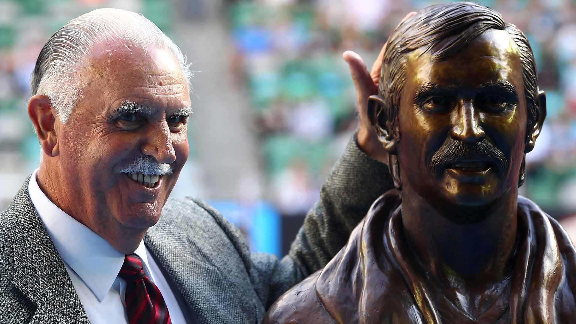 Former Australian player Owen Davidson poses after being inducted into the Australian Tennis Hall of Fame at Melbourne Park in 2011.