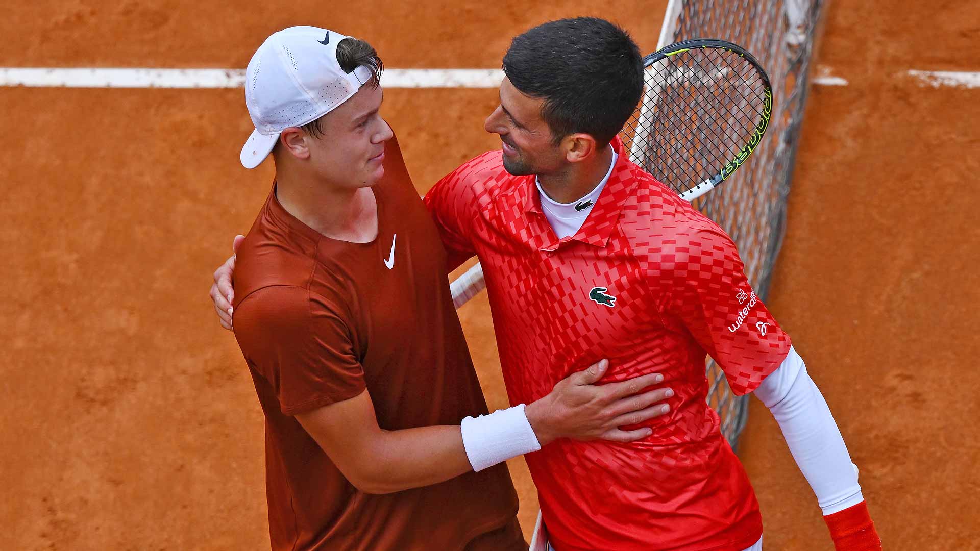 Holger Rune defeats Novak Djokovic in three sets on Wednesday in Rome.