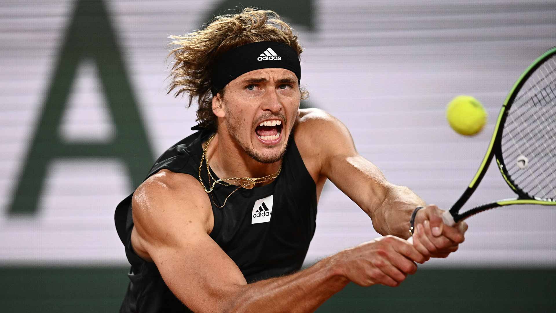 Alexander Zverev powers a backhand against Rafael Nadal during the pair's 2022 Roland Garros semi-final.