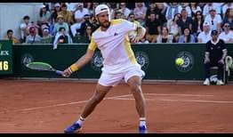 Lucas Pouille defeats Jurij Rodionov in straight sets Sunday to reach the second round at Roland Garros.