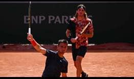 Petros Tsitsipas and Stefanos Tsitsipas during Tuesday's doubles action in Paris.