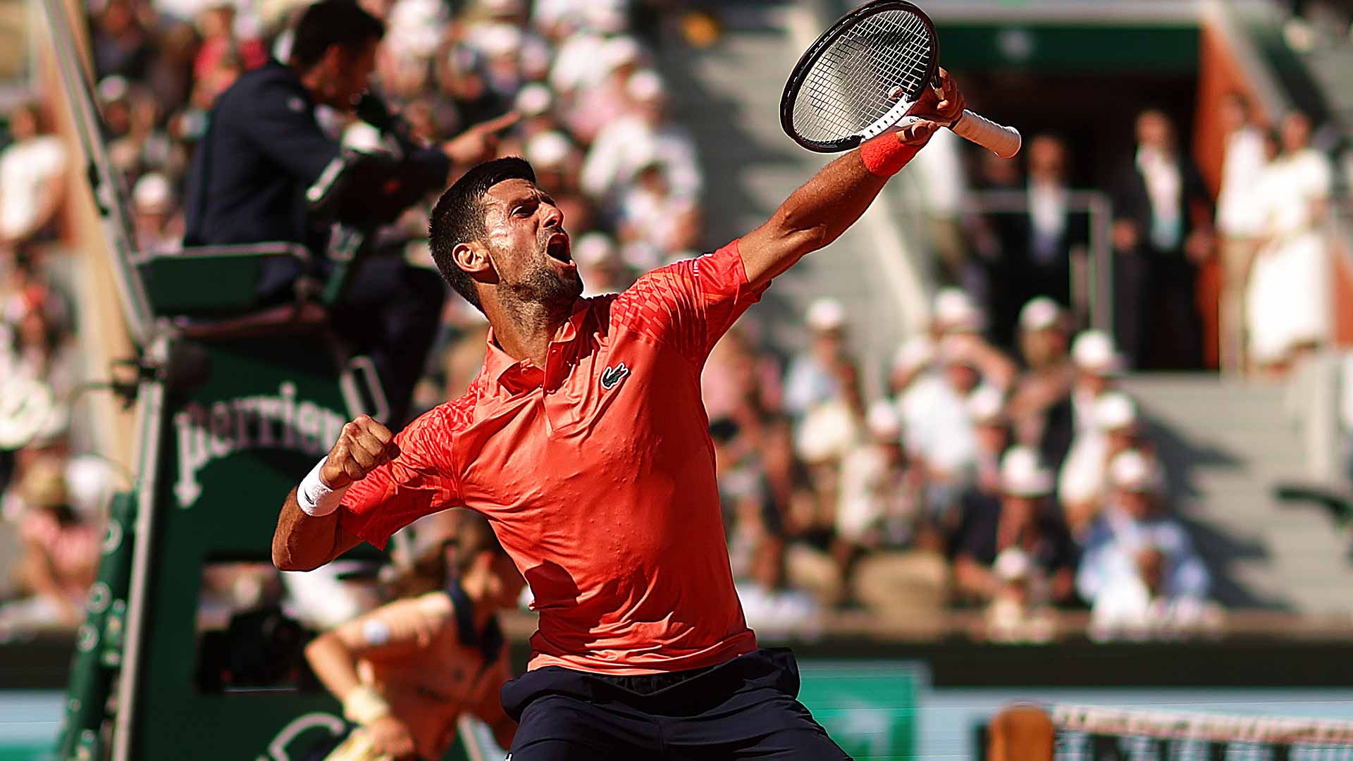 Novak Djokovic celebrates winning a point during Friday's third round at Roland Garros.