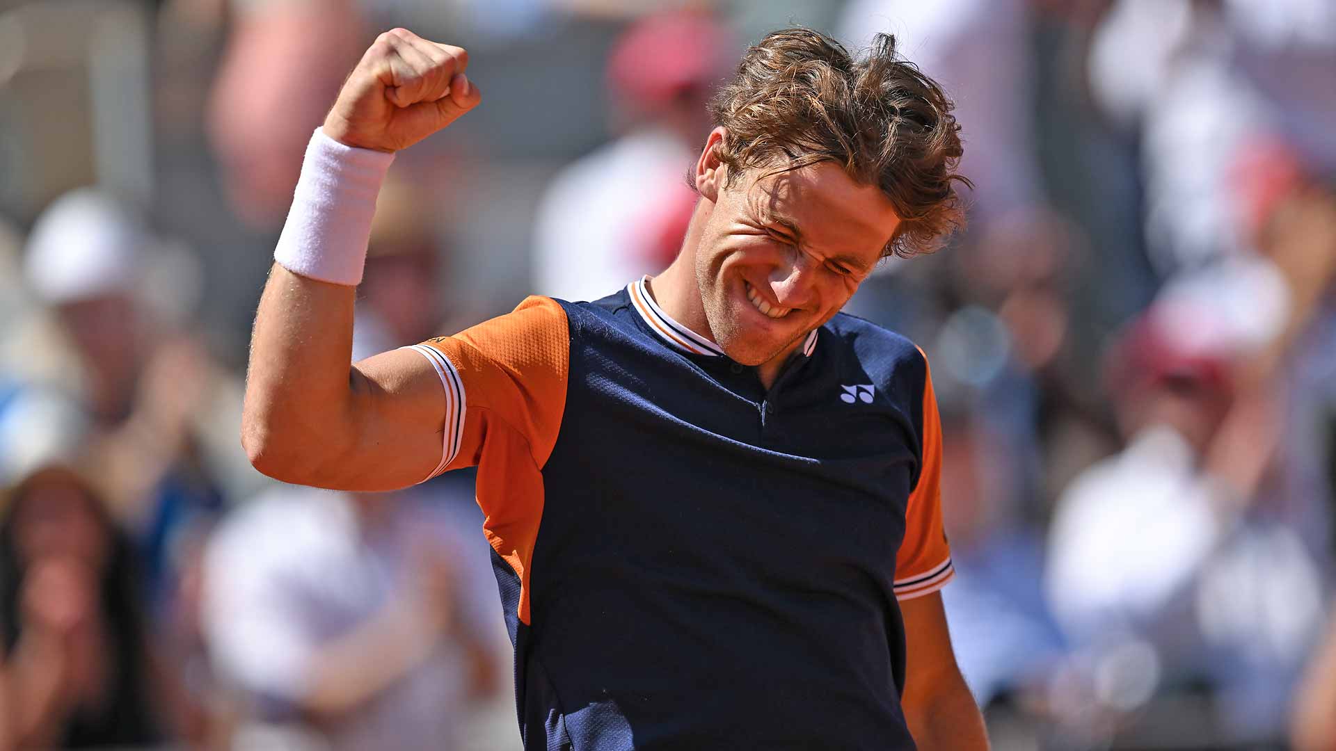 Casper Ruud celebrates after defeating Nicolas Jarry on Monday at Roland Garros to reach his third major quarter-final.