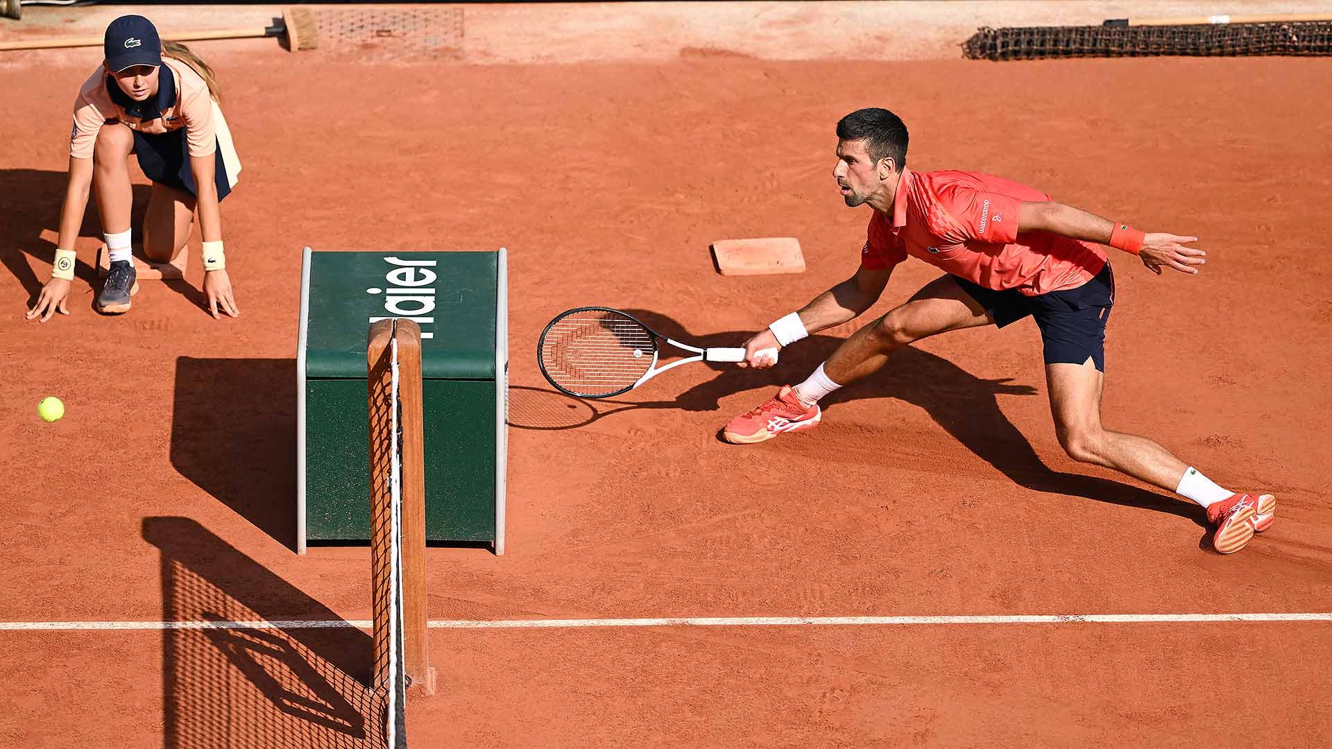 Novak Djokovic gets creative against Karen Khachanov in the Roland Garros quarter-finals.
