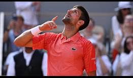Novak Djokovic celebrates after defeating Carlos Alcaraz on Friday in Paris.