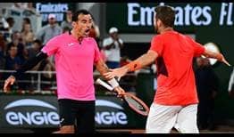 Ivan Dodig and Austin Krajicek celebrate after clinching their maiden major title as a team on Saturday at Roland Garros.
