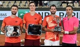 Austin Krajicek (second from right) and Ivan Dodig (right) beat Sander Gille and Joran Vliegen to triumph at Roland Garros on Saturday.