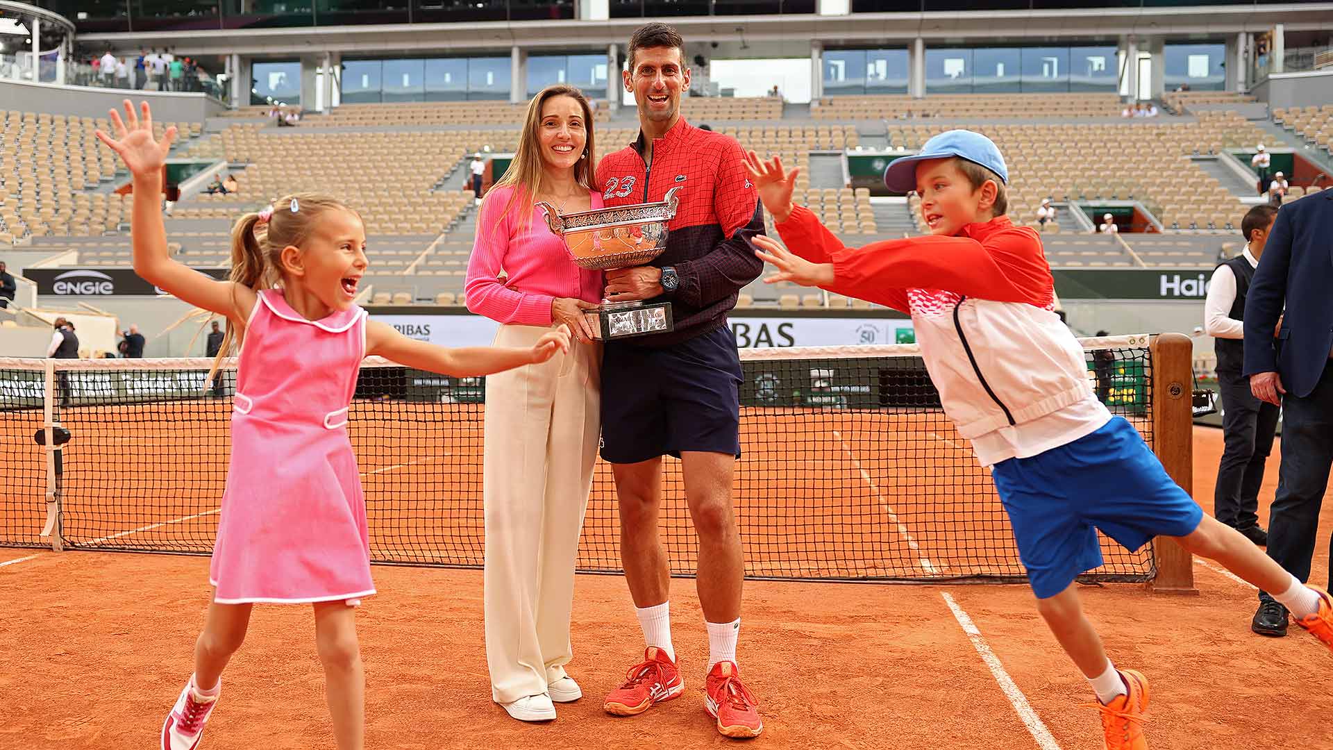 Novak Djokovic celebrates his record-breaking 23rd Grand Slam title with wife Jelena, daughter Tara and son Stefan.