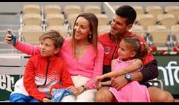 Novak Djokovic celebrates with his family after winning Roland Garros for a third time.