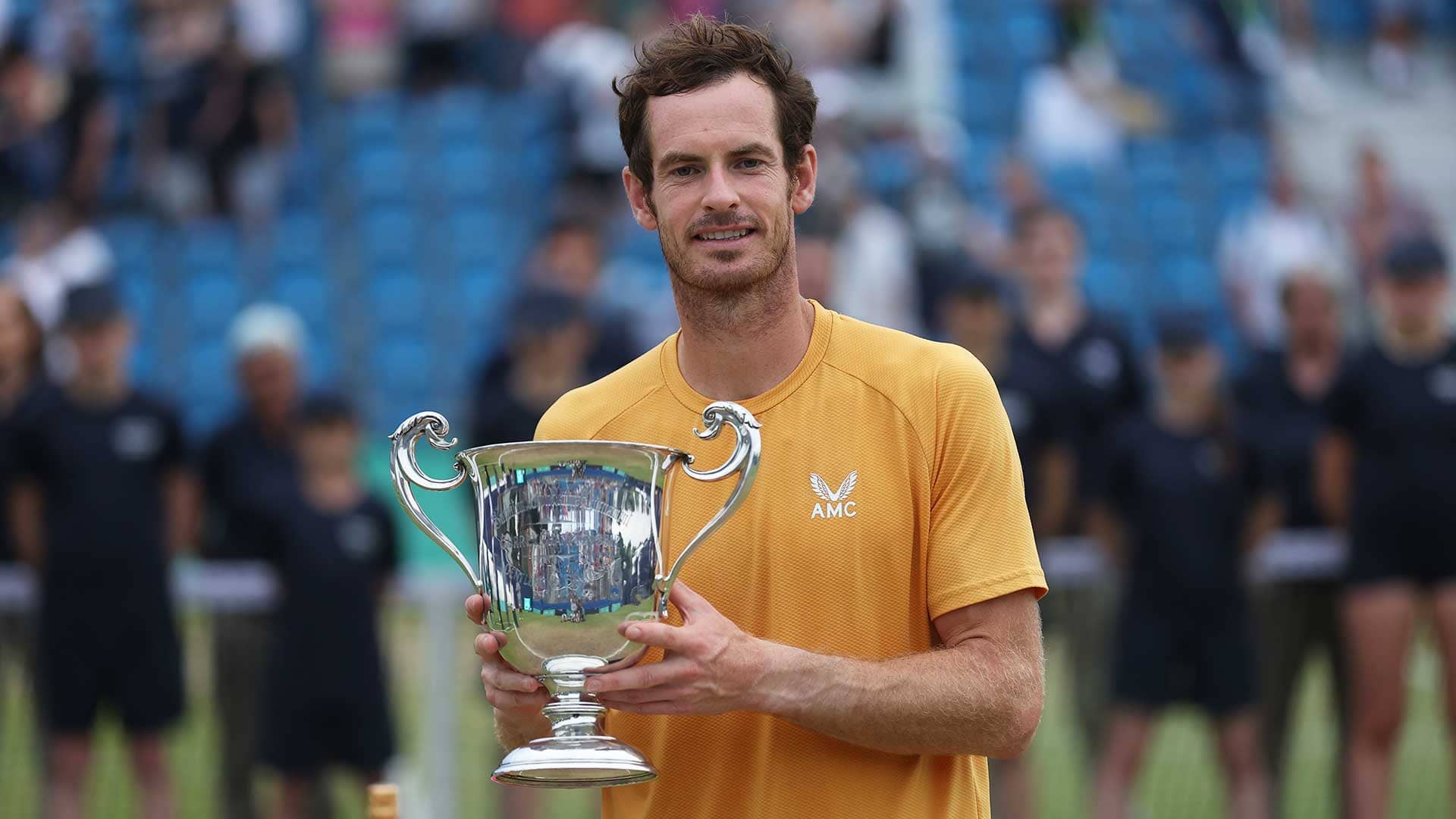 Andy Murray celebrates winning the title in Surbiton.