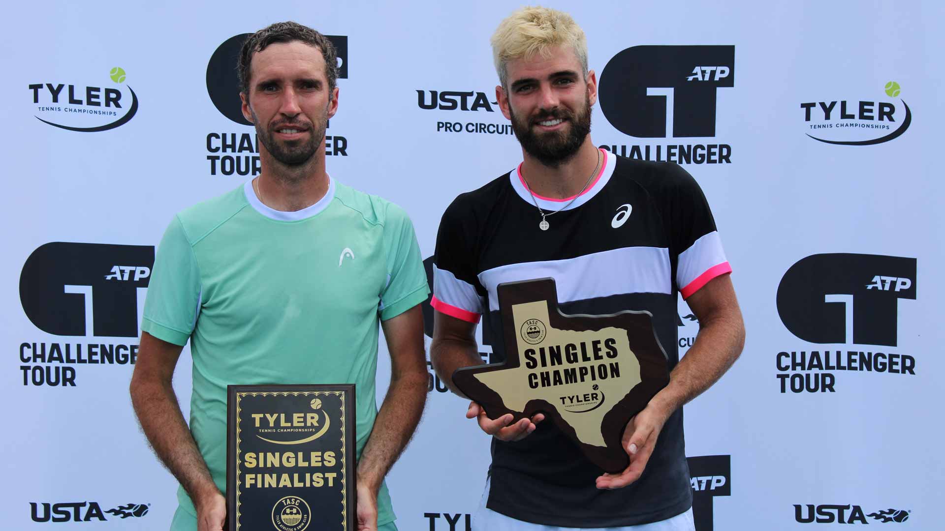 Mikhail Kukushin (left) and <a href='https://www.atptour.com/en/players/nicolas-moreno-de-alboran/mw18/overview'>Nicolas Moreno De Alboran</a> at the <a href='https://www.atptour.com/en/scores/archive/tyler/2873/2024/results'>Tyler Tennis Championships</a> trophy ceremony.