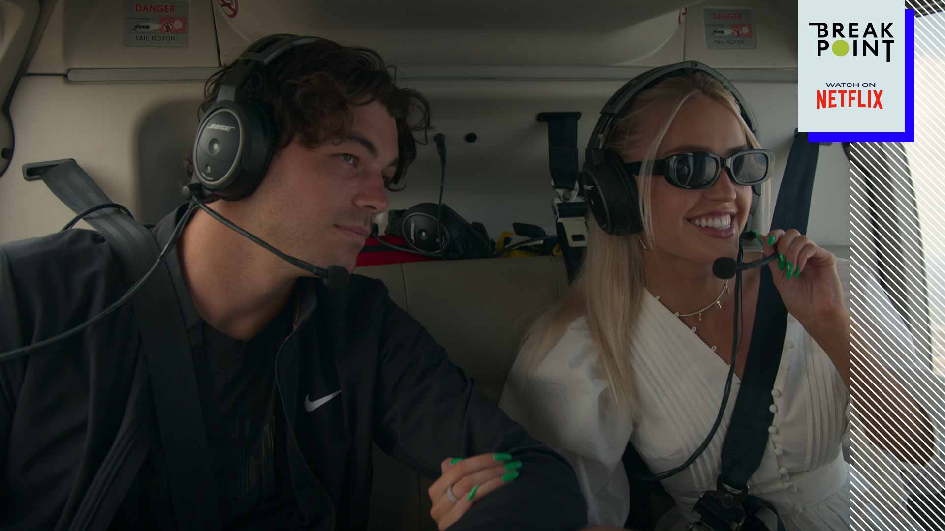 Taylor Fritz and girlfriend Morgan Riddle in a helicopter ahead of the 2022 US Open.
