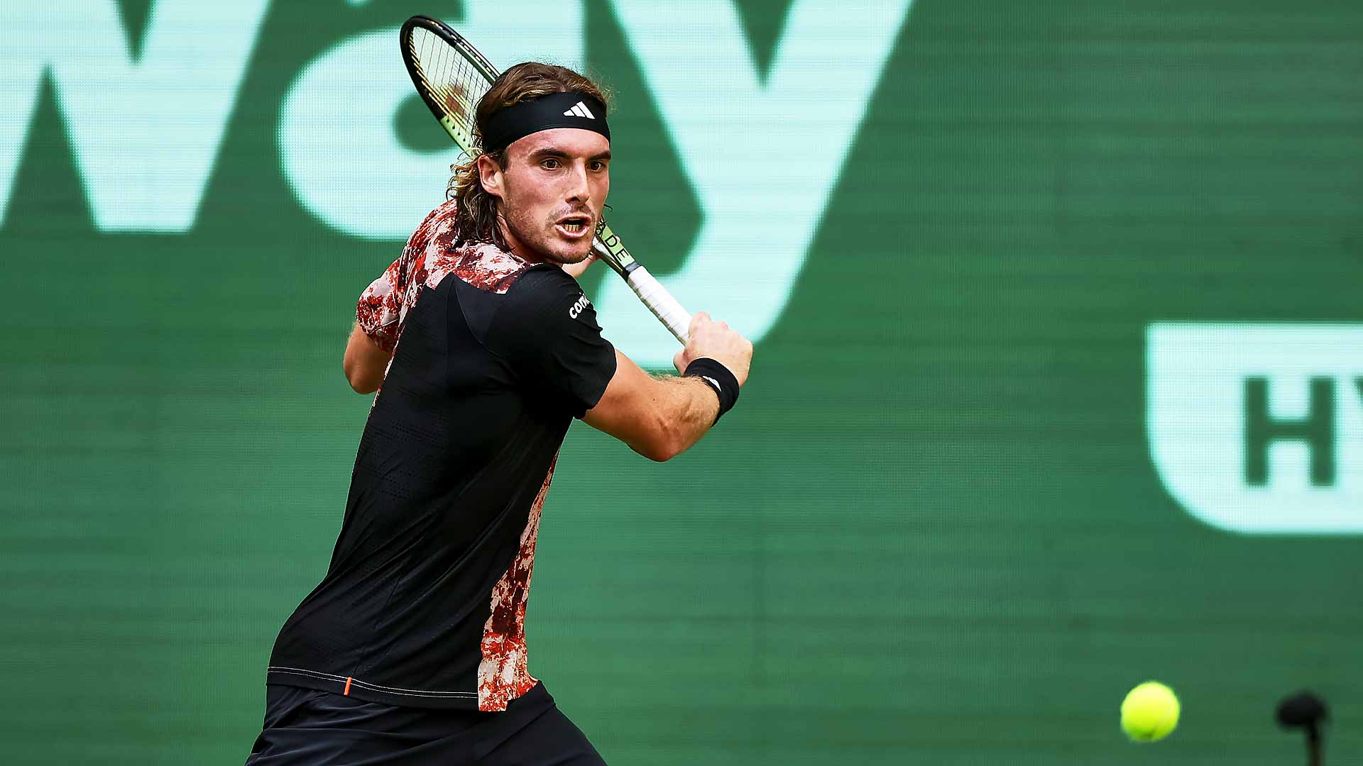 Stefanos Tsitsipas hits 46 winners en route to victory against Gregoire Barrere on Monday at the Terra Wortmann Open in Halle.