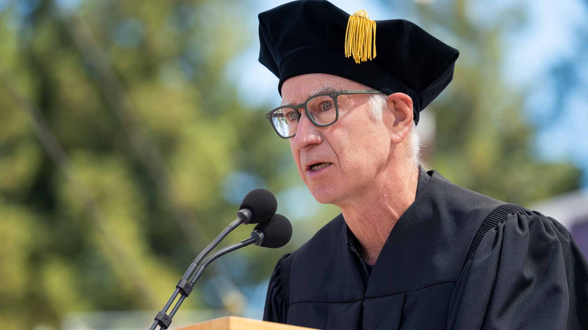 John McEnroe delivers the commencement speech at Stanford University on 18 June 2023.