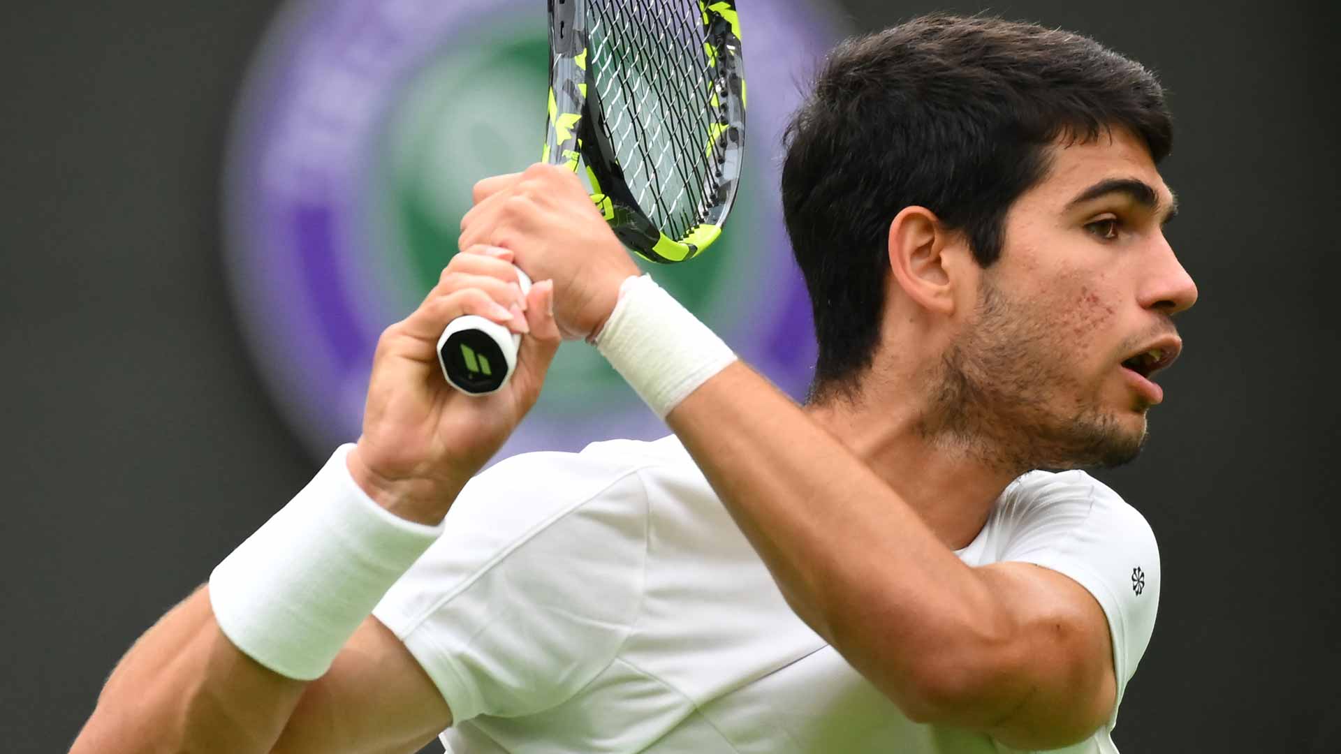 Carlos Alcaraz defeated Jeremy Chardy in his first-round match Tuesday at Wimbledon.