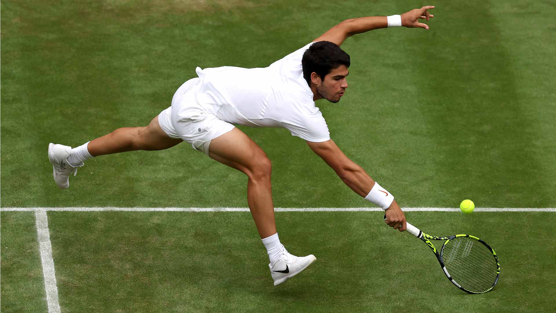 Carlos Alcaraz reaches his first Wimbledon quarter-final with a four-set win against Matteo Berrettini.