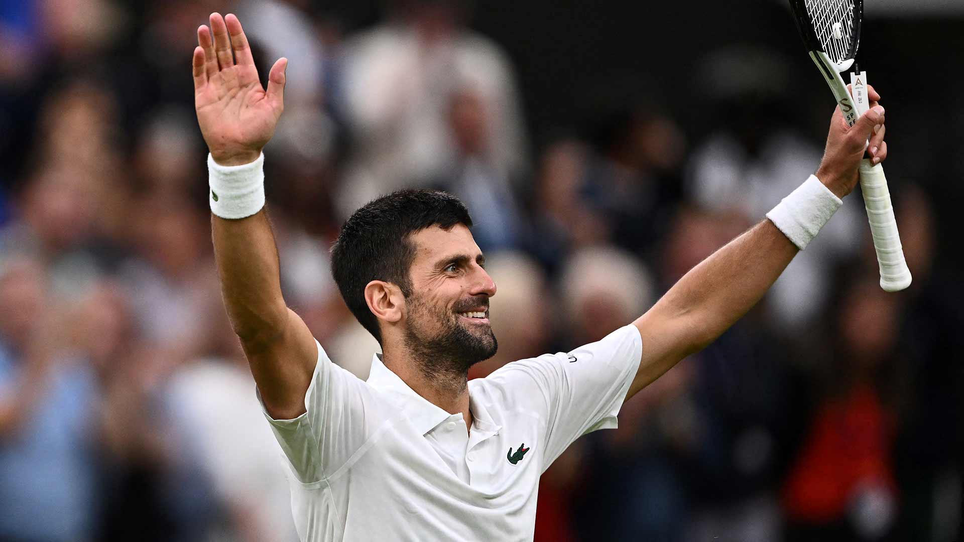 Novak Djokovic celebrates after notching his 34th consecutive Wimbledon win on Friday against Jannik Sinner.